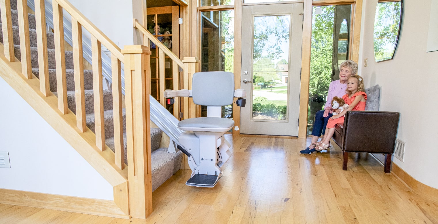 Bruno Elite stair lift installation with family